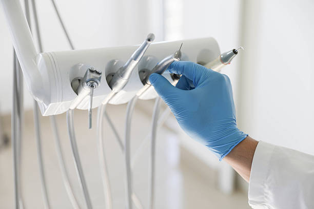 Professional Emergency Dentist technician working in Lake Delta, NY